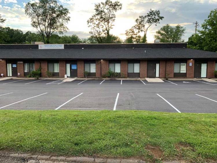 Commercial building in Frederick, MD with a well-maintained parking lot by Driveways 2Day