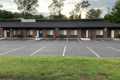 Commercial parking lot after professional seal coating in Frederick, MD