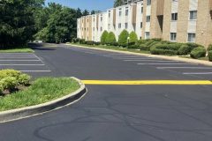 Commercial seal coating and striping process on a large parking lot in Frederick, MD