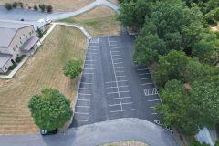 Applying commercial seal coating to a large parking lot in Frederick, MD