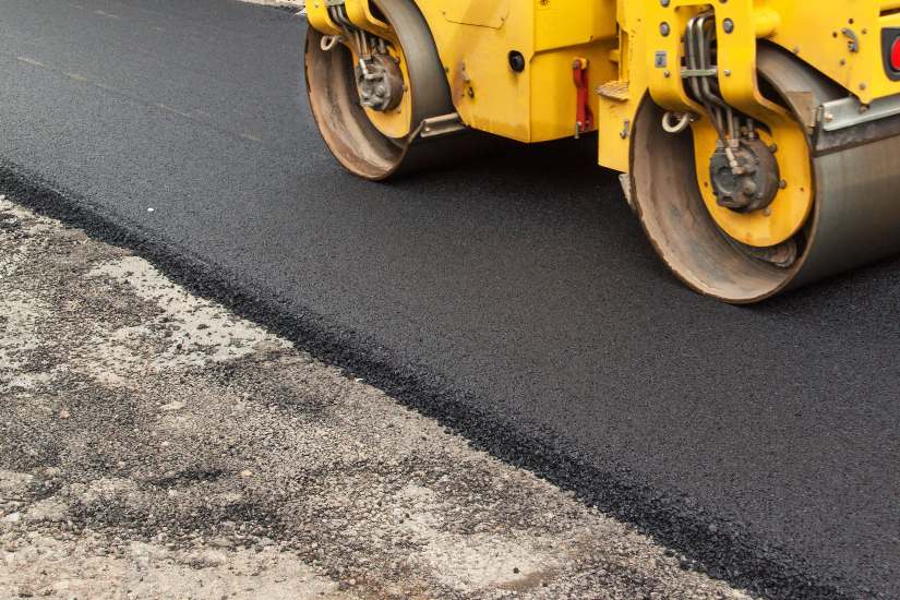 Newly built smooth asphalt driveway in Frederick, MD by Driveway 2Day